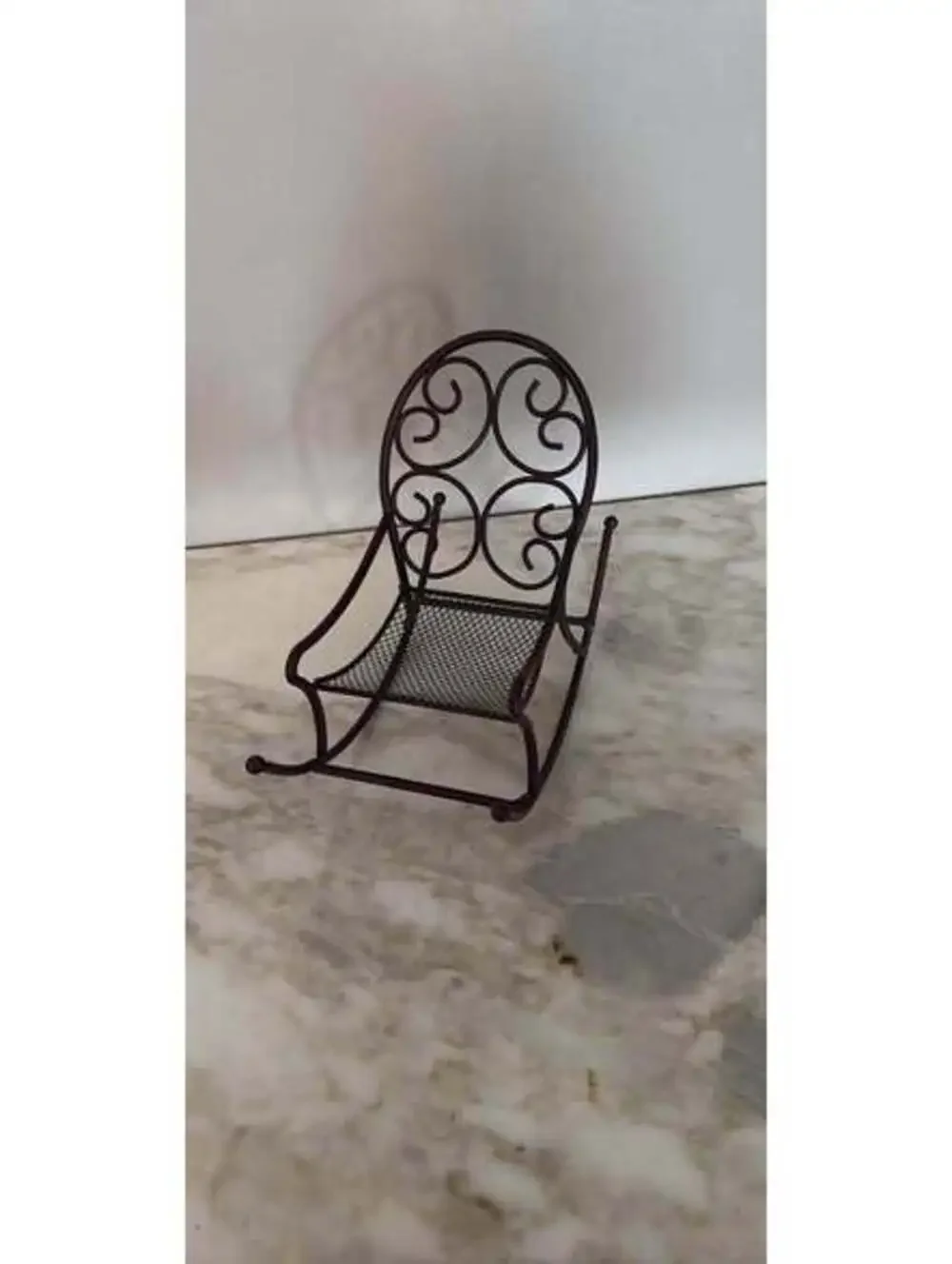 Vintage miniature wire mesh dollhouse rocking chair with scrollwork back